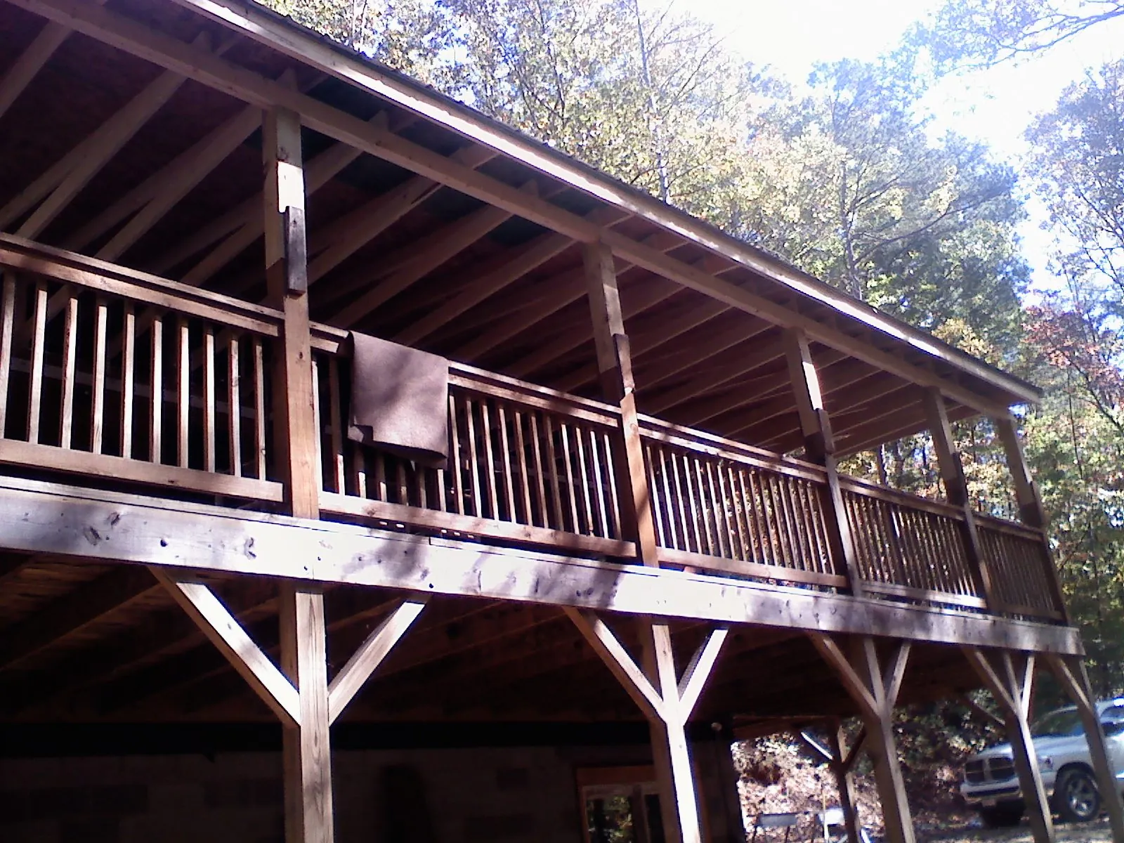 Timber framing under a new elevated porch and deck — Roof Leak Repair in Earling by Roofing Brothers